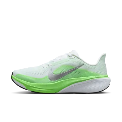 White and green Nike running shoes