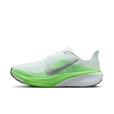 White and green Nike running shoes
