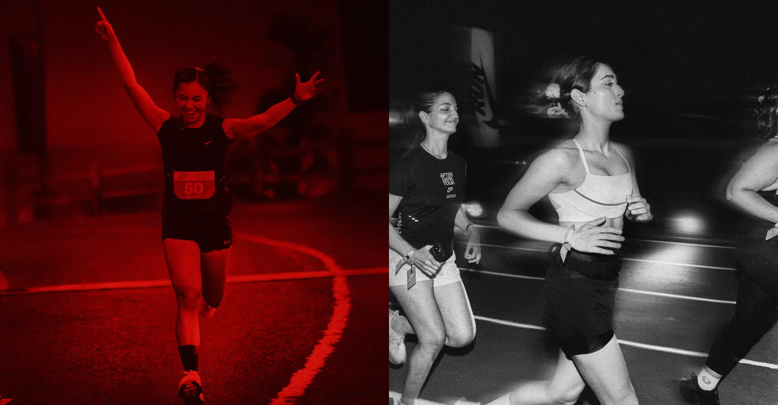 A runner celebrating with both arms raised on a red-lit track beside runners training together at night