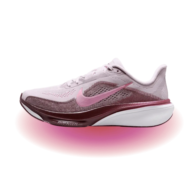 A Nike running shoe with pink and burgundy responsive cushioning