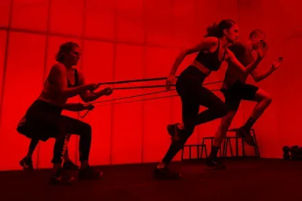 Runners training with resistance bands