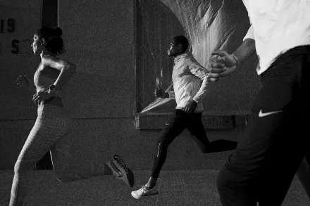 Runners side by side on a city street